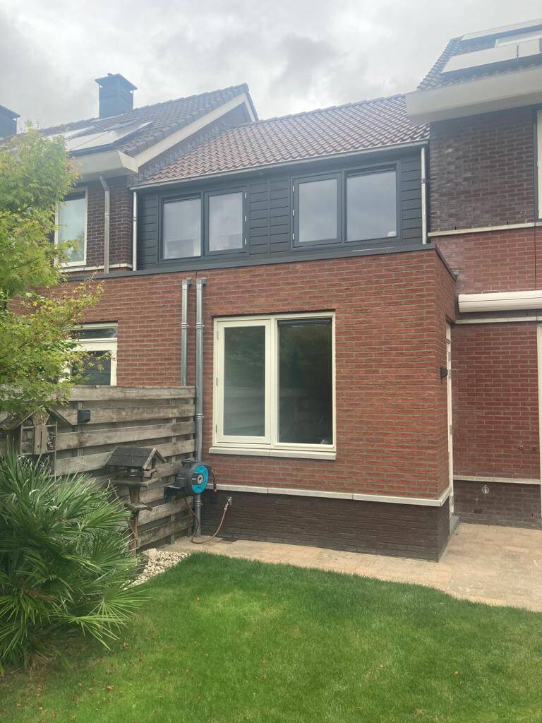 afbeelding groene huis